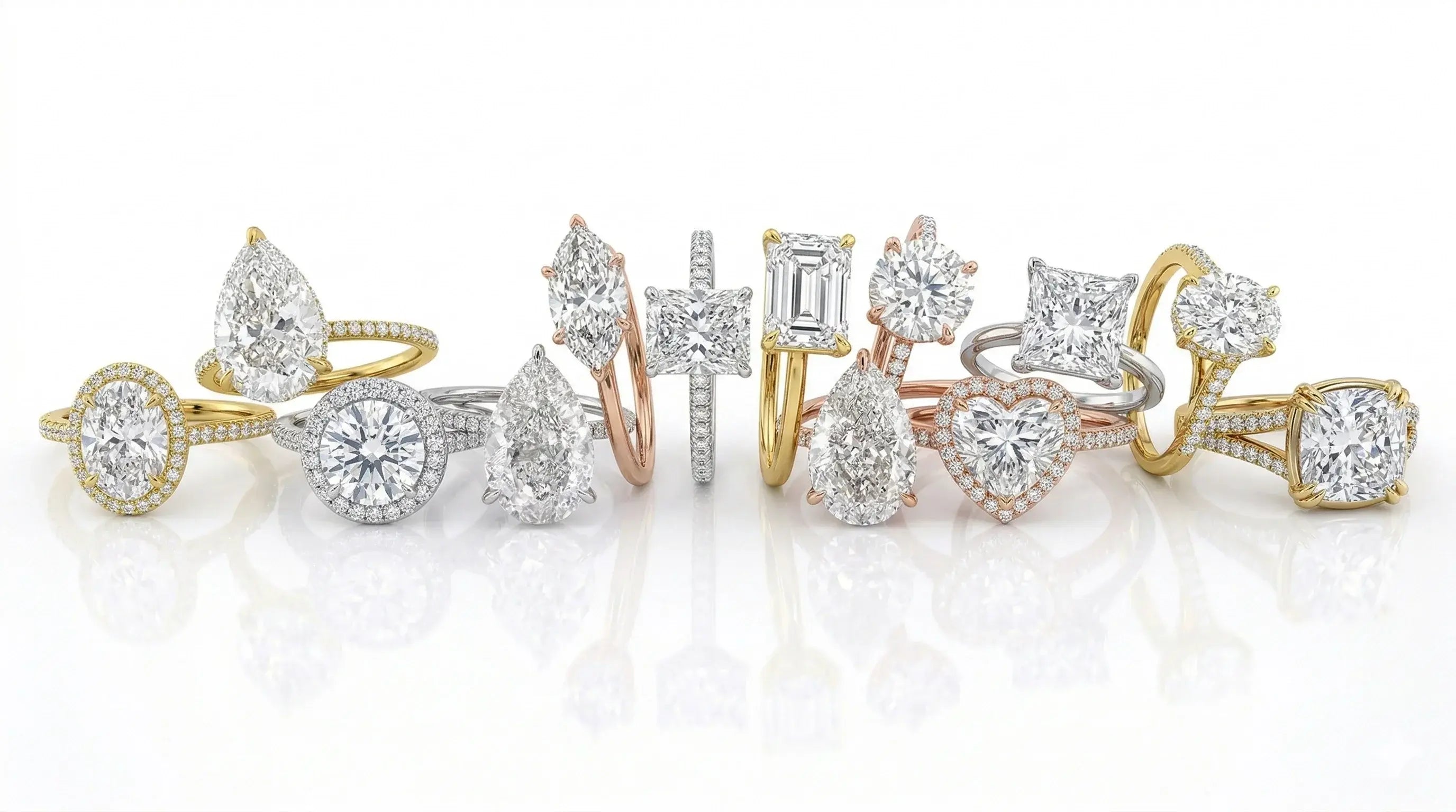 Luxury collection of bespoke engagement rings including oval, pear, and heart-shaped diamonds in white and rose gold - ApolloGem Cape Town.