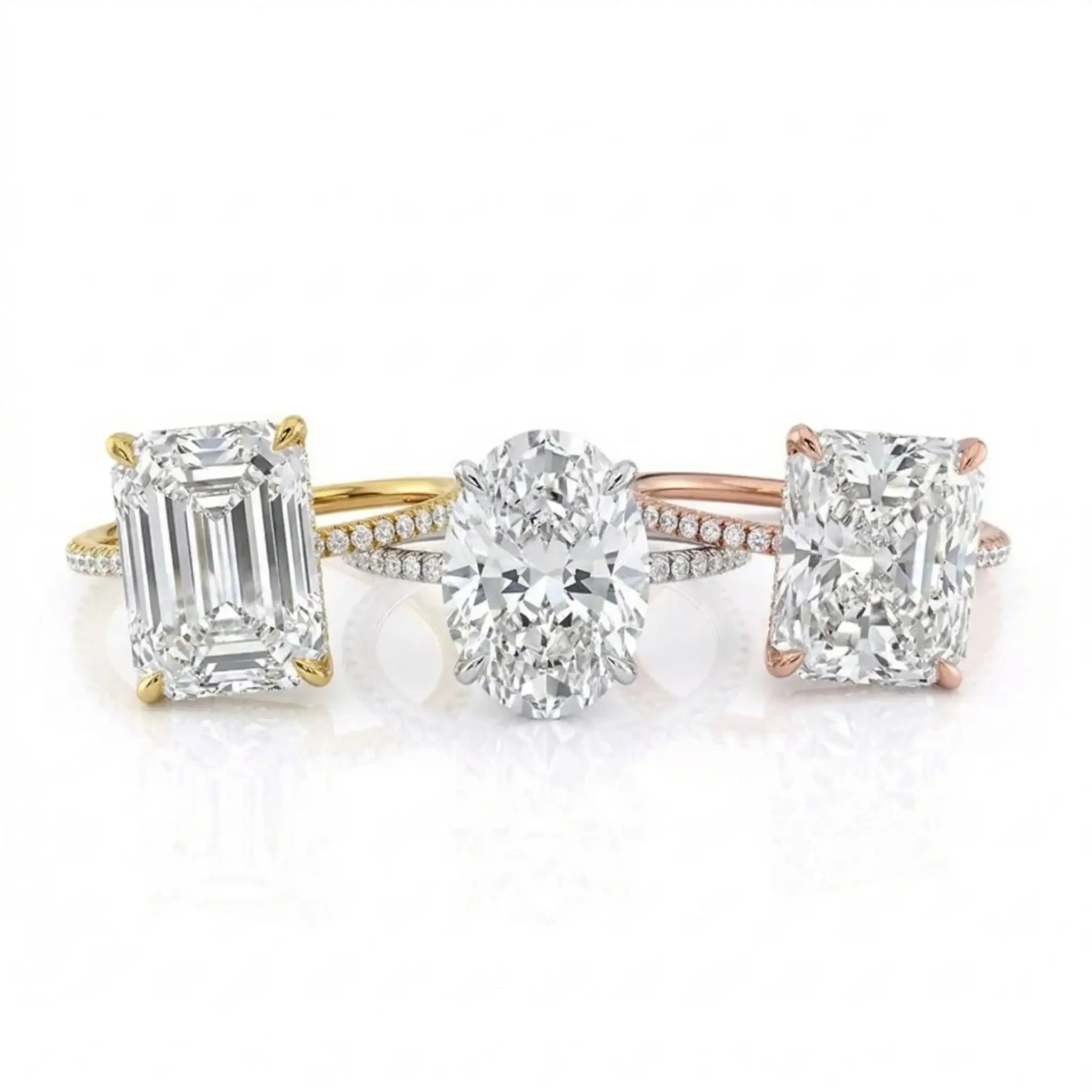 Three diamond engagement rings featuring Emerald, Oval, and Radiant cut stones in bespoke gold settings by ApolloGem Cape Town.