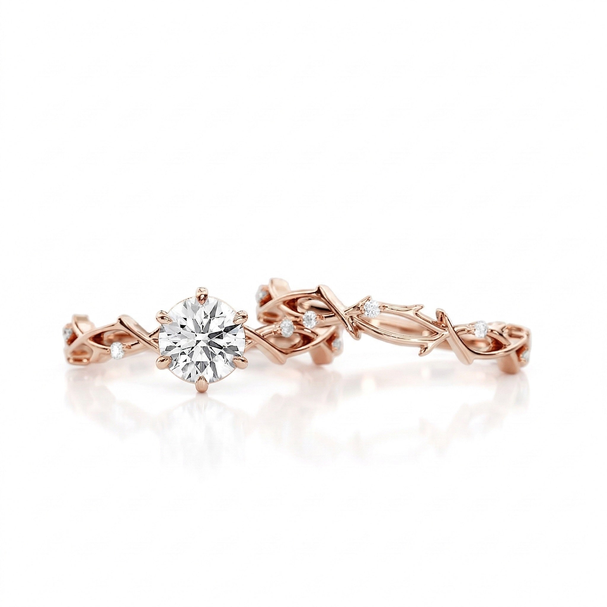 The Round Duo Floral Vine set on a finger showing the artistic textured silhouette and brilliant fire.
