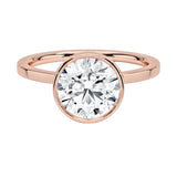 The Architectural Round moissanite solitaire ring with a flat rose gold band ApolloGem