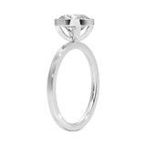 Top-down view of a D-color VVS1 round stone in a polished white gold bezel setting
