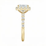 Gold ring with a diamond on a white background