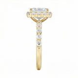 Gold ring with a diamond on a white background