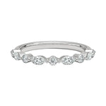 Mixed cut eternity ring with marquise and round moissanites shared prong setting