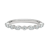 Mixed cut eternity ring with marquise and round moissanites shared prong setting