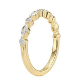 Gold ring with diamonds on a white background