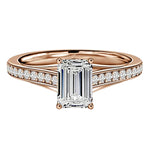 Yellow gold emerald cut ring with channel set diamonds classic bridal jewelry