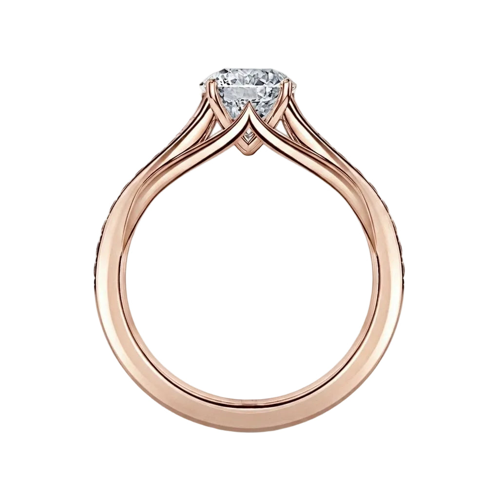 Rose gold ring with a diamond on a white background