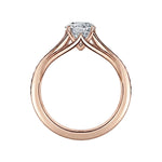 Rose gold ring with a diamond on a white background