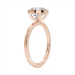 Side view of The Cushion Bezel ring showing the secure gold setting and flat-edge band