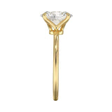 Cushion cut Moissanite lab grown diamond engagement ring round shank with a four claw setting, on a gold band, against a white background.Moissanite engagement ring cape town south africa grand diamonds ralph jacobs jeulia 