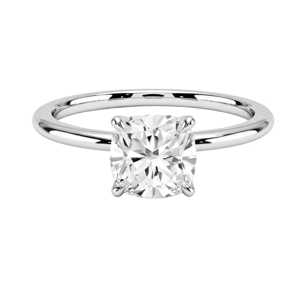 Cushion-cut moissanite solitaire engagement ring in a classic minimalist setting, handcrafted by ApolloGem.