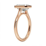 Top-down view of a D-color VVS1 cushion stone in a polished rose gold bezel