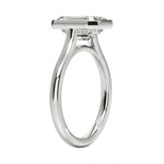 Top-down view of a D-color VVS1 cushion stone in a polished white gold bezel
