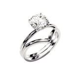Precision-engineered flush-fit moissanite bridal set in solid gold with GRI certified stones.