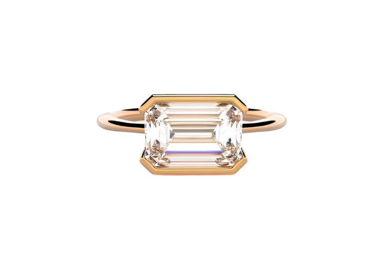 Emerald cut moissanite solitaire engagement ring in a modern East-West column setting ApolloGem.