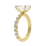 Detailed side view of an emerald cut eternity ring showing professional prong settings and GRI certified stone quality