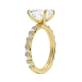 Detailed side view of an emerald cut eternity ring showing professional prong settings and GRI certified stone quality