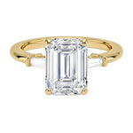 Emerald cut moissanite engagement ring yellow gold tapered baguette side stones South Africa