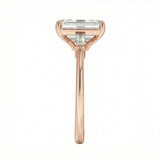 Rose gold ring with a rectangular diamond on a white background ApoloGem Engagement ring Emerald cut rose gold