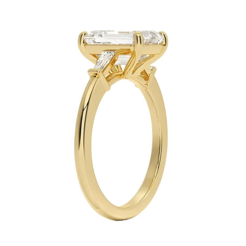 High set emerald cut ring with tapered baguettes side profile details ApolloGem