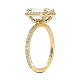 Designer halo engagement ring emerald shape 18k yellow gold affordable luxury bridal jewelry