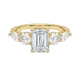 Yellow gold emerald cut engagement ring multi shape side stones South Africa