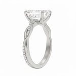 Side profile of the Emerald Solo Vine ring showing the contrast between the smooth gold and pavé-set strands.