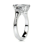 Detailed profile view showing the hidden halo and pavé-set bridge on a heavy gold band.