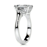 Detailed profile view showing the hidden halo and pavé-set bridge on a heavy gold band.