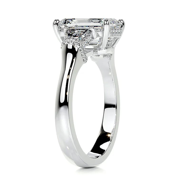 Detailed profile view showing the hidden halo and pavé-set bridge on a heavy gold band.