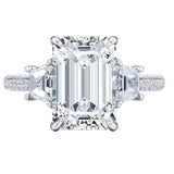 Luxury emerald cut moissanite engagement ring with trapezoid side stones and triple-row pavé band in white  gold ApolloGem.