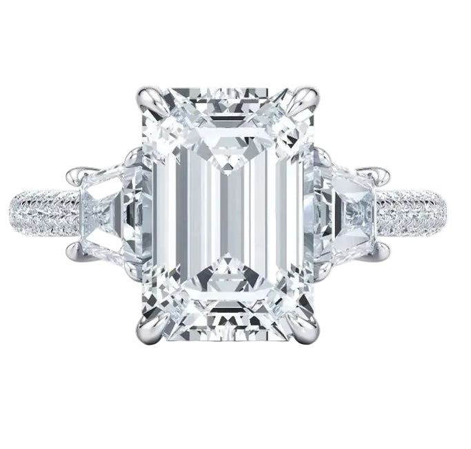 Luxury emerald cut moissanite engagement ring with trapezoid side stones and triple-row pavé band in white  gold ApolloGem.