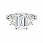 Grand emerald cut moissanite trilogy engagement ring in white gold ApolloGem.