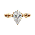 The Enchanted Vine pear cut moissanite engagement ring with twisted vine band ApolloGem