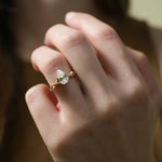 The Enchanted Vine pear cut moissanite engagement ring with twisted vine band ApolloGem
