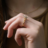 Side view of The Enchanted Vine ring showing the organic branch detail and secure prongs