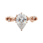 The Enchanted Vine pear cut moissanite engagement ring with twisted vine band ApolloGem