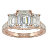 Emerald cut moissanite trilogy engagement ring with a pavé-set rose gold band ApolloGem.