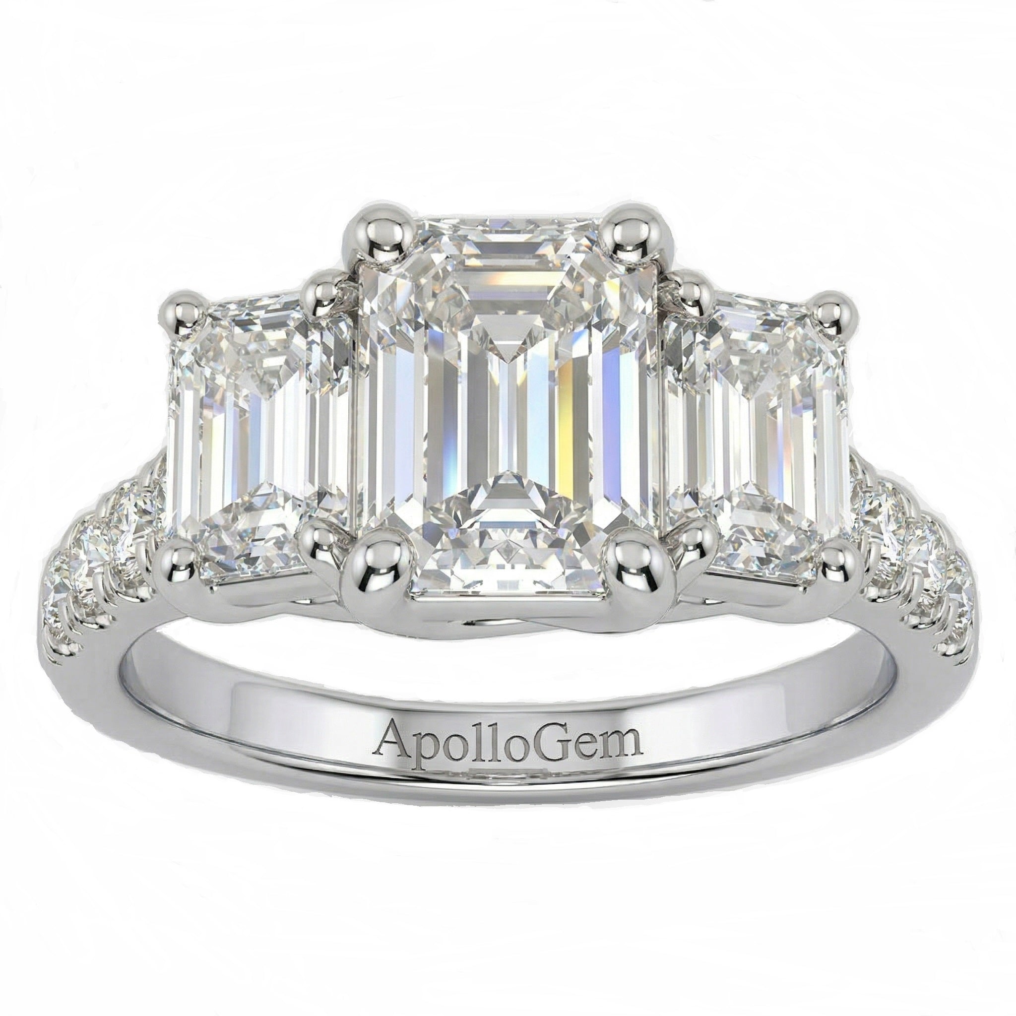 Emerald cut moissanite trilogy engagement ring with a pavé-set white gold band ApolloGem.