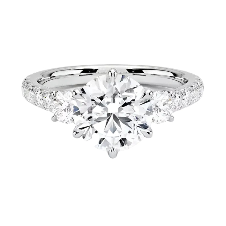 Round brilliant moissanite engagement ring white gold  gold pavé band three stone style