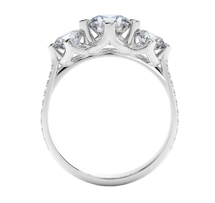 Top-down view of a D-color VVS1 graduated three-stone round moissanite ring with accent stones.