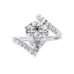 Modern floating pear cut solitaire engagement ring with an open-shank bypass in white gold ApolloGem.