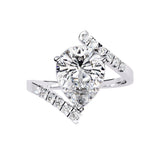 Modern floating pear cut solitaire engagement ring with an open-shank bypass in white gold ApolloGem.