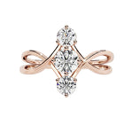 Round brilliant moissanite trilogy engagement ring with a modern infinity loop split-shank ApolloGem.