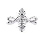 Round brilliant moissanite trilogy engagement ring with a modern infinity loop split-shank ApolloGem.