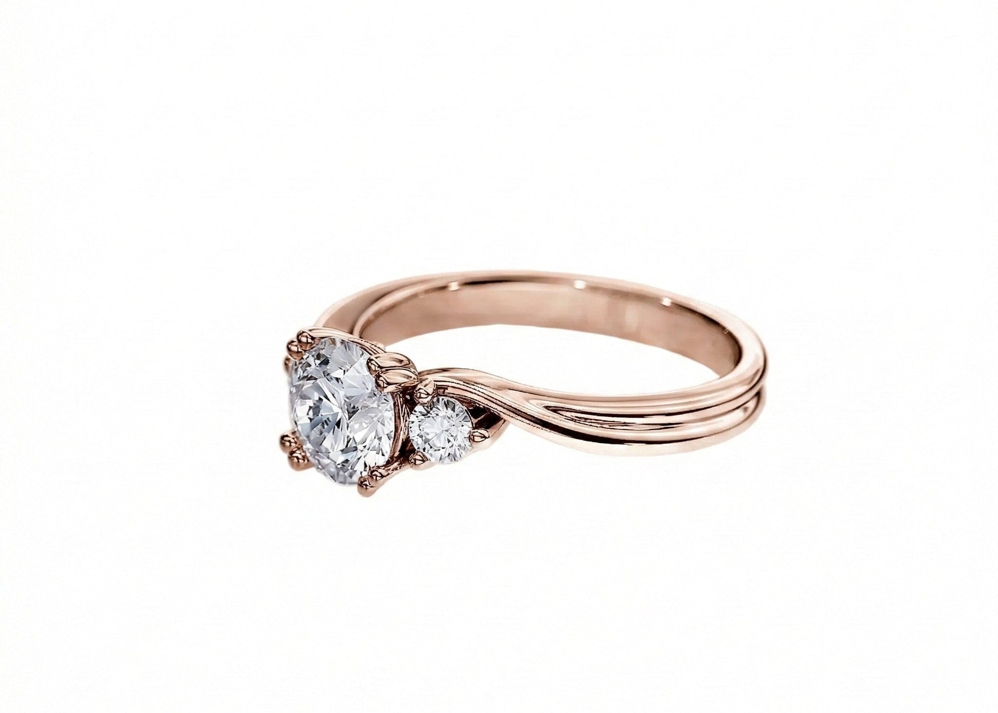 Rose gold ring with heart-shaped diamond on a white background