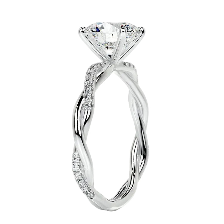 Close-up of a high-quality D-color VVS1 round brilliant moissanite center stone on a shimmering pavé twisted shank.