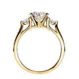 Gold ring with a diamond on a white background