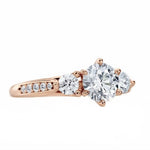 Detailed side view showing the architectural baskets and shimmering pavé shank of the Legacy ring.